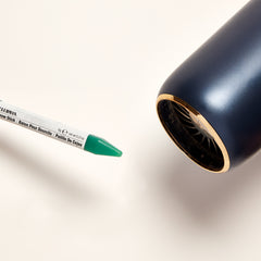 Manwax stick getting melted by hair dryer white background