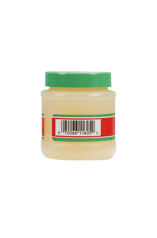 Back view of Tres Flores Brilliantine Pomade 3.25 oz. jar, showing barcode and company details.