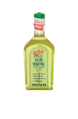 A clear 6-ounce bottle of Clubman Pinaud After Shave Lotion Lilac Vegetal showing its herbal green colored liquid contents