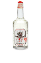 Clubman Pinaud Eau de Portugal Hair Tonic in a clear glass bottle, hydrating and refreshing for hair care.