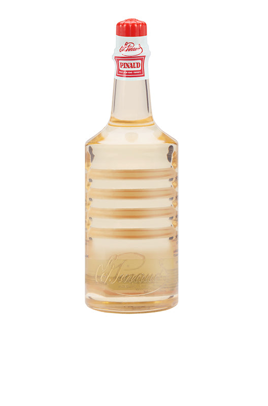Clubman Pinaud Hair Tonic in a vintage-style ribbed bottle, perfect for scalp and hair conditioning.