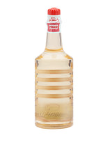 Clubman Pinaud Hair Tonic in a vintage-style ribbed bottle, perfect for scalp and hair conditioning.