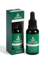 Clubman Pinaud Beard & Tattoo Oil in a boxed set, a nourishing formula that enhances beard softness and tattoo vibrancy.