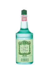 Front view of a clear 12.5-ounce bottle of Clubman Pinaud Lime Sec Eau de Cologne showing its turquoise liquid contents