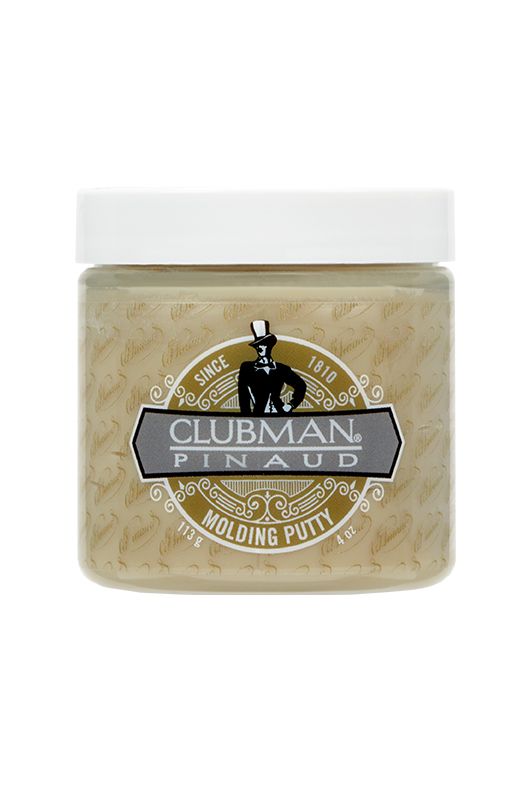 Front view of a clear 4 ounce container of Clubman Molding Putty showing brand logo & its creamy white hair putty contents