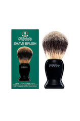 Clubman Pinaud Shave Brush next to its box, featuring classic green packaging and a high-quality brush.