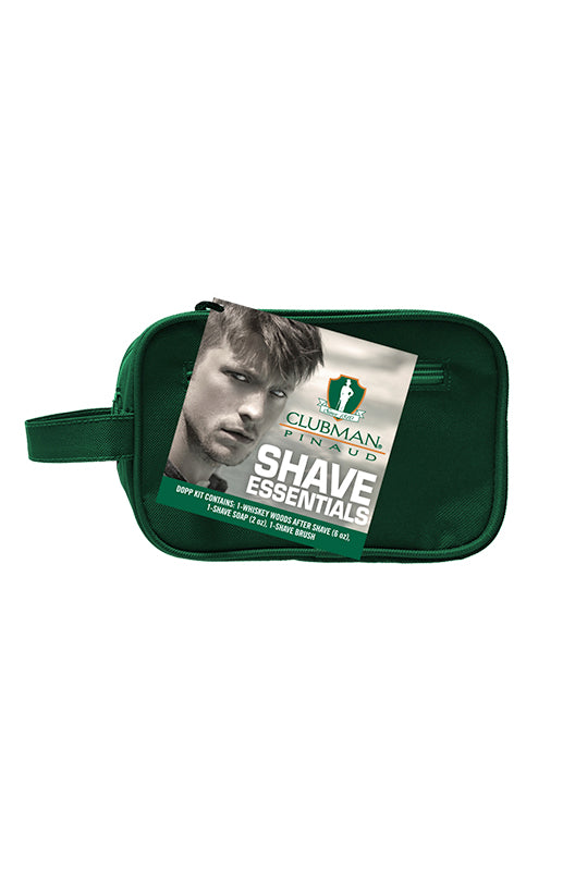 Clubman Pinaud shave essentials dopp kit with a label featuring a stylish man and shaving essentials inside.