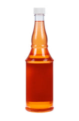 Jeris Musk for Men rear view, showcasing the rich amber-colored liquid in its traditional barber-style bottle.