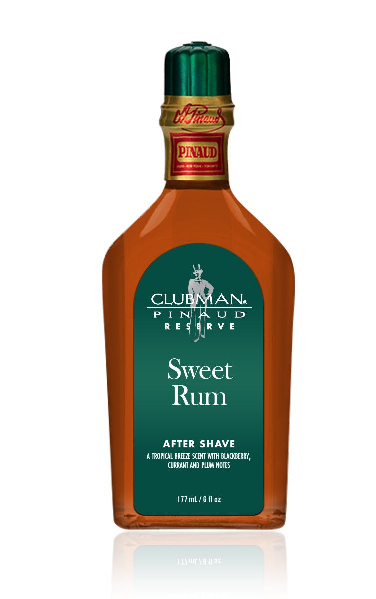 Front view of a clear bottle of Clubman Reserve Sweet Rum After Shave Lotion showing its deep amber-colored liquid contents