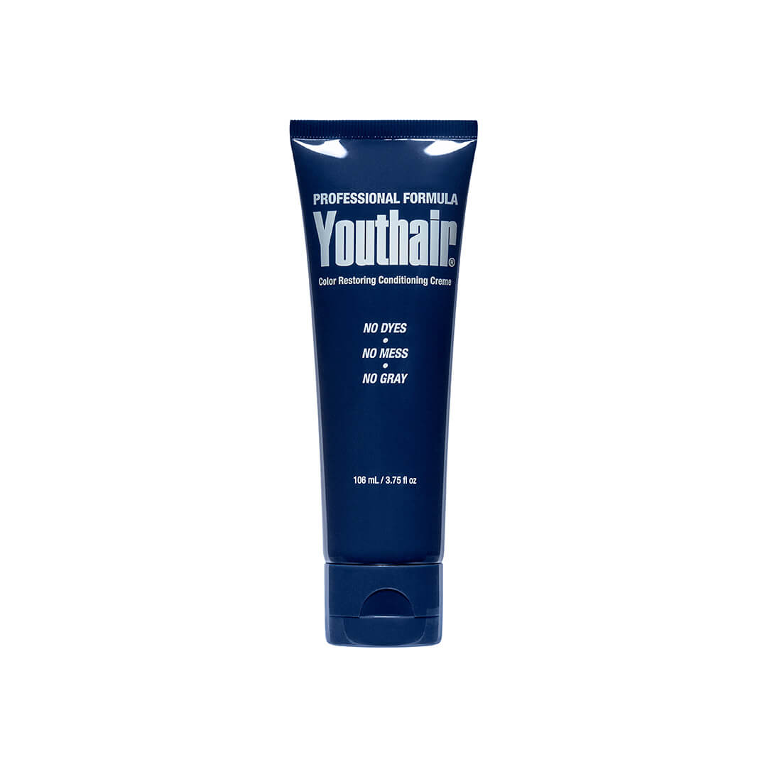 Youthair Color Restoring Creme in a sleek navy tube, gradually restores natural hair color without dyes or mess.